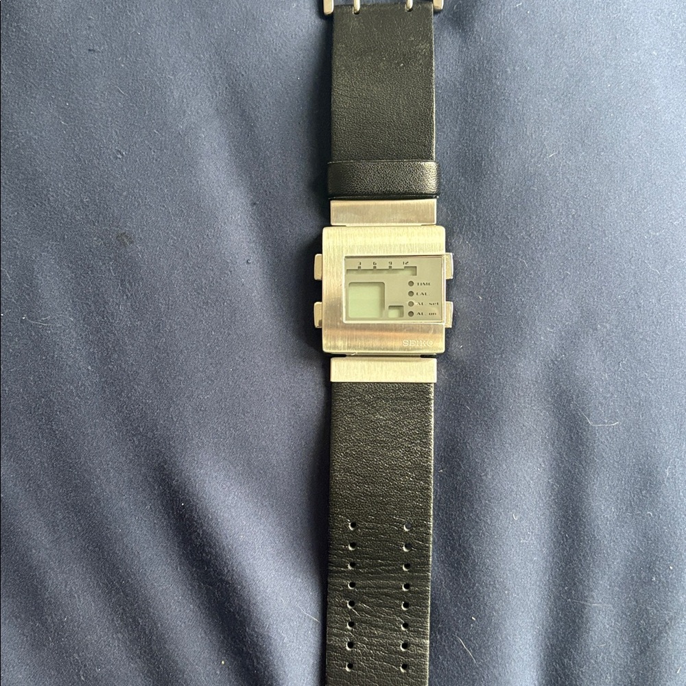 Casio Black and Silver Digital Watch from future times. Great thick leather band